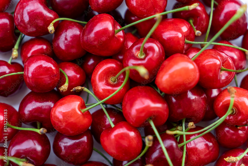 Pile of cherries on the market. Sweet cherries as background. Selective focus. Pile of cherries on the market. Sweet cherries as background. Selective focus.