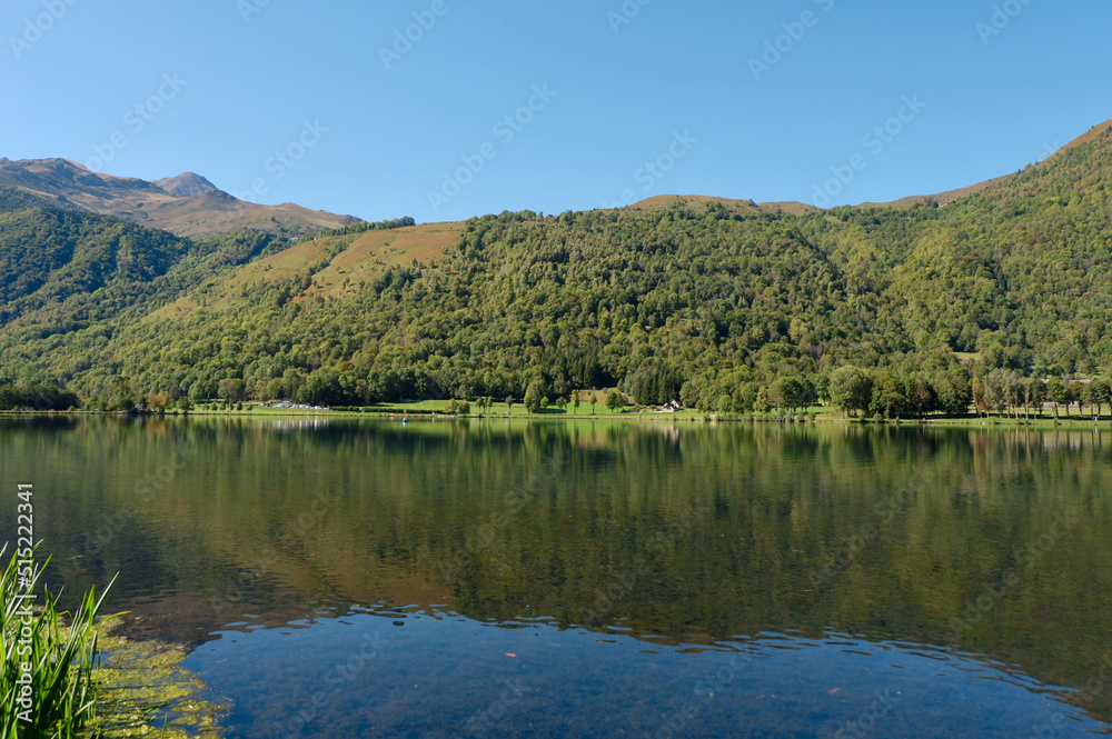 Calm mountain lake in the tourist area in Saint Lary village, ‎⁨Saint-Lary⁩, ⁨Midi-Pyrenees⁩, ⁨France⁩