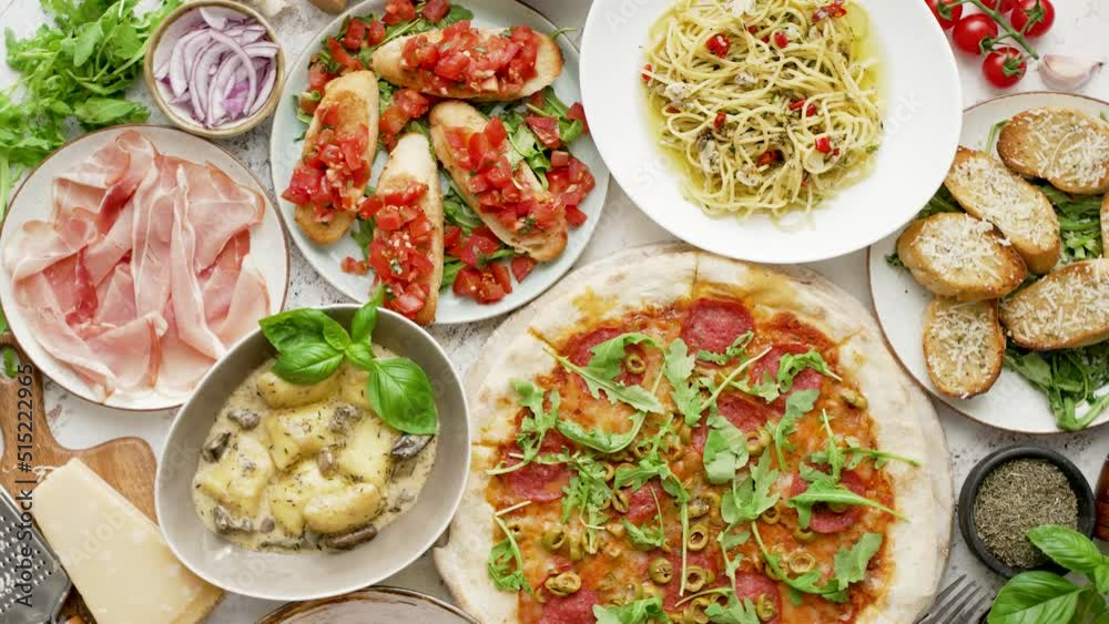 Various assorted Italian food served on a plates