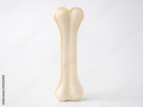 Pressed rawhide bone shaped dog chews. photo