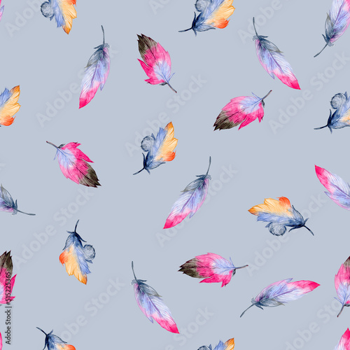 Watercolor birds feathers pattern. Seamless pattern on blue background