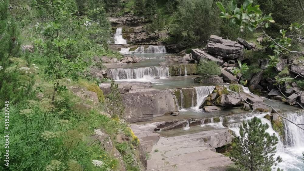 mountain river with cascading waterfall mountain river with cascading waterfall