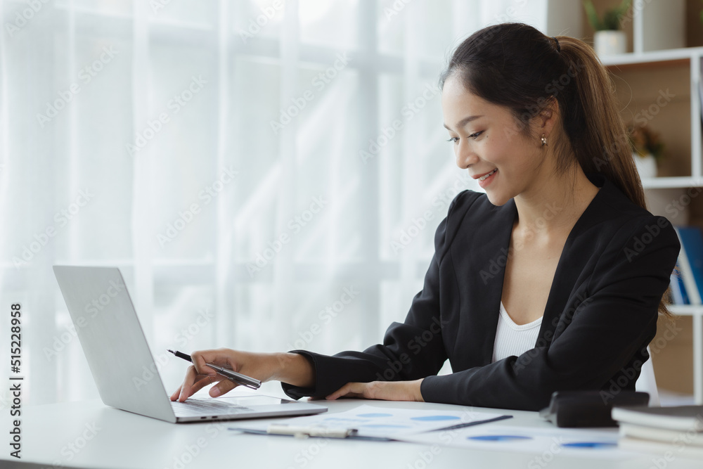 Beautiful Asian woman is a businesswoman who leads a new generation of startups, a woman who runs and manages a business plan to build confidence and stability in business, woman-led business concept. Beautiful Asian woman is a businesswoman who leads a new generation of startups, a woman who runs and manages a business plan to build confidence and stability in business, woman-led business concept.