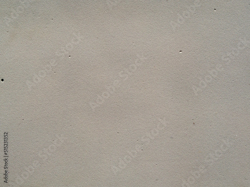 White textured surface for the background. The texture of white foam foam in close-up.