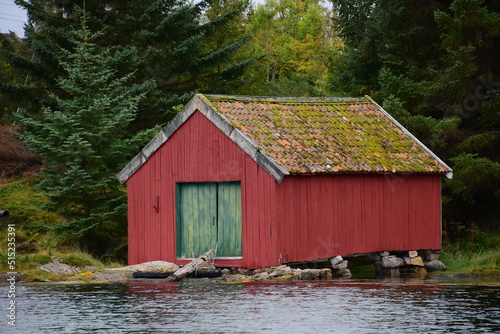 Fototapeta Old boathouse in coastal Norway.