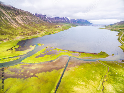 Aerial view of lake Olafsfjardarvatn and valley at the end of fjord Olafsfjordur, Fjallabyggà, north Iceland. photo