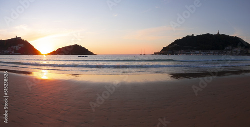 La Concha beach and bay at sunset in the city of Donostia-San Sebastian, Euskadi photo