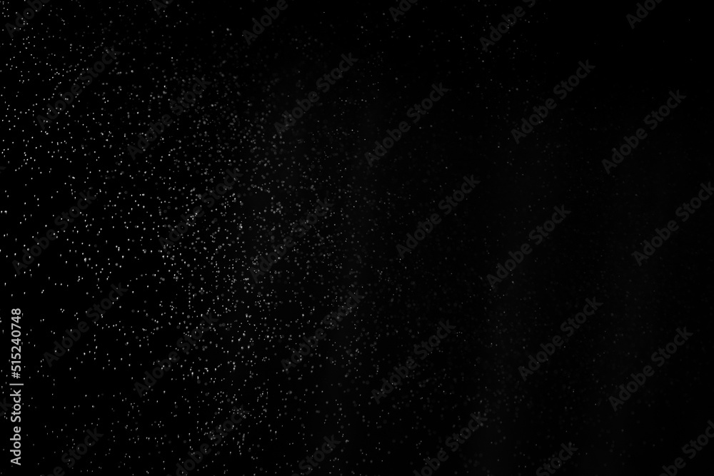 Abstract cloud with falling drops isolated on black background. White clouds, fog or smog moving on a black background. Drops of rain for overlay. Layout for your photo.