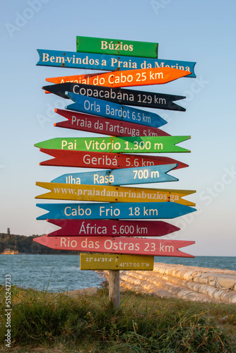Nice and colorful sign of destinations and distances by the beach in Brazil.  © Alberto