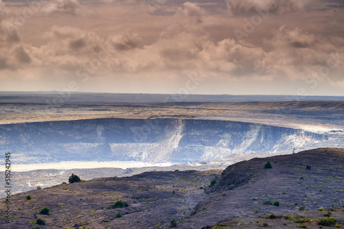 Large volcano in Mauna Loa. Landscape of smoky mountain on Big Island, Hawaii. A dormant volcano in open secluded area. Overcast sky with steaming volcanic area and a crater