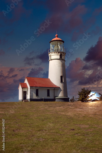 Lighthouse on coastal Oregon with a dramatic sky.