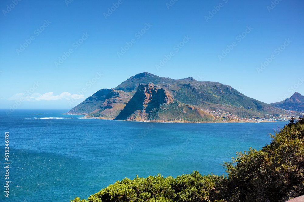 A mountain in Hout Bay, South Africa on a summer day with blue sky copyspace. Panaramona view of a mountain peak, popular tourist attraction with hiking rails for travellers on adventurous vacation A mountain in Hout Bay, South Africa on a summer day with blue sky copyspace. Panaramona view of a mountain peak, popular tourist attraction with hiking rails for travellers on adventurous vacation