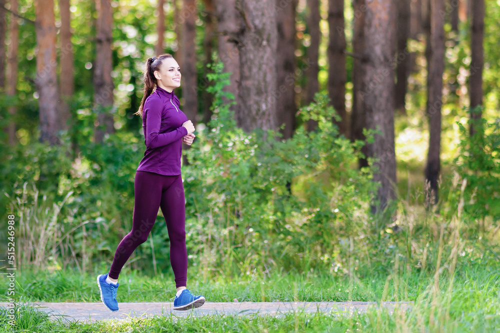 Young girl with fluttering hair on a morning jog. health Young girl with fluttering hair on a morning jog. health
