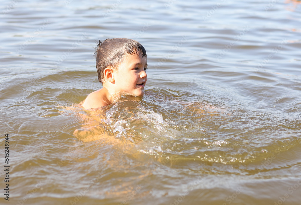 child playing in the water