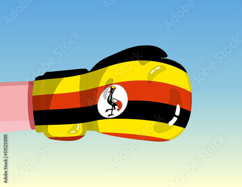 Flag of Uganda on boxing glove. Confrontation between countries with competitive power. Offensive attitude. Separation of power. Template ready design.