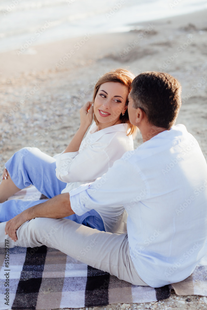 Happy romantic middle aged couple are by the sea. Closeup photo. Happy romantic middle aged couple are by the sea. Closeup photo.