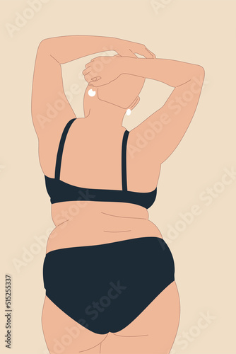 Curvy young woman posing in swimwear. Shaved head plus size model. Body positive model concept. View from the back.
