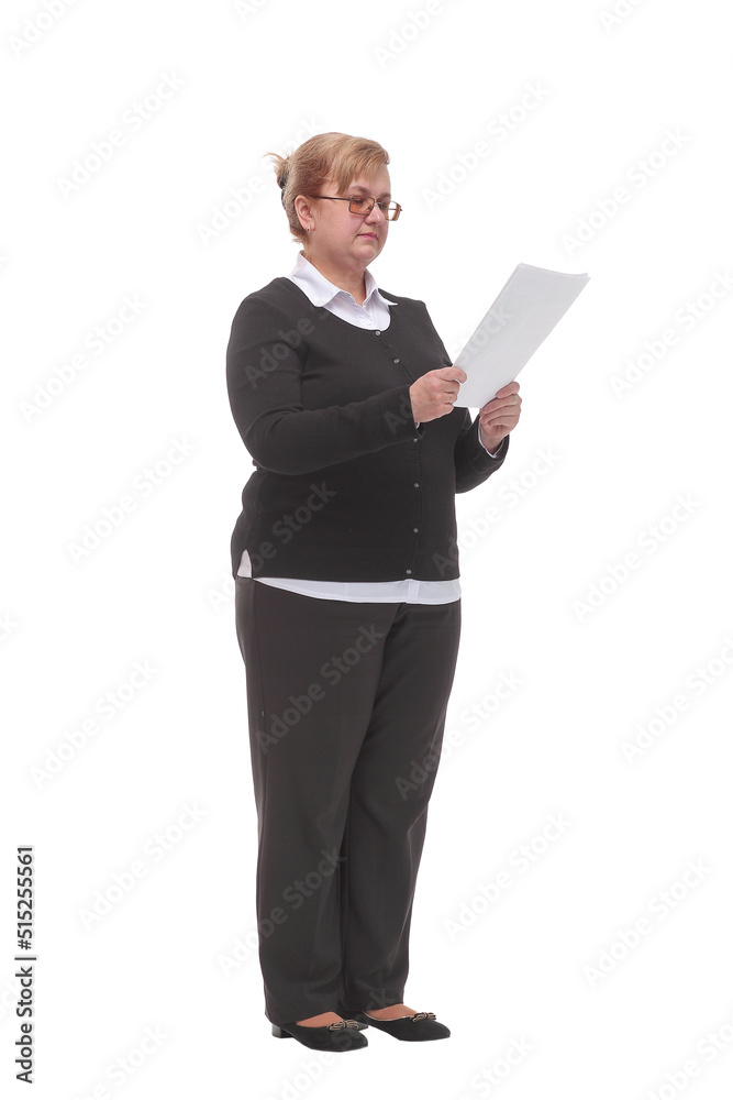 Side view of serious mature woman reading documents Side view of serious mature woman reading documents
