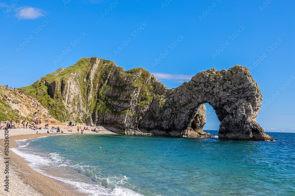 Durdle Door (sometimes written Durdle Dor) is a natural limestone arch on the Jurassic Coast near Lulworth in Dorset, England.