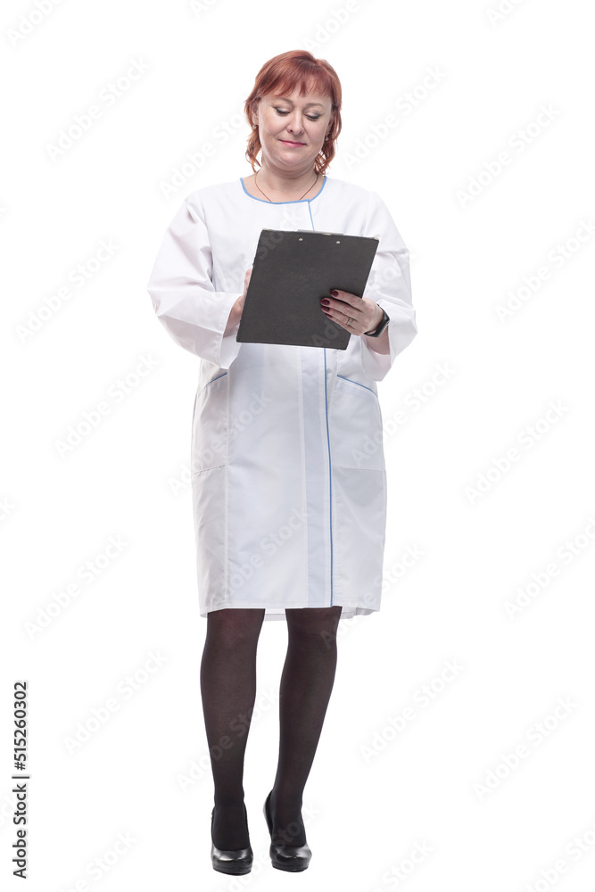 in full growth. competent female doctor with clipboard . in full growth. competent female doctor with clipboard .