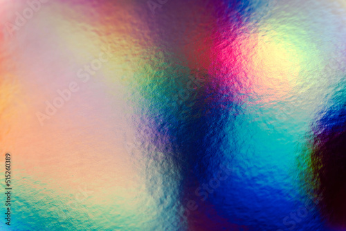 Colorful holographic iridescent holo bg texture, blue, pink and green abstract background photo