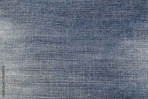 Background in the color of jeans. © Dragan