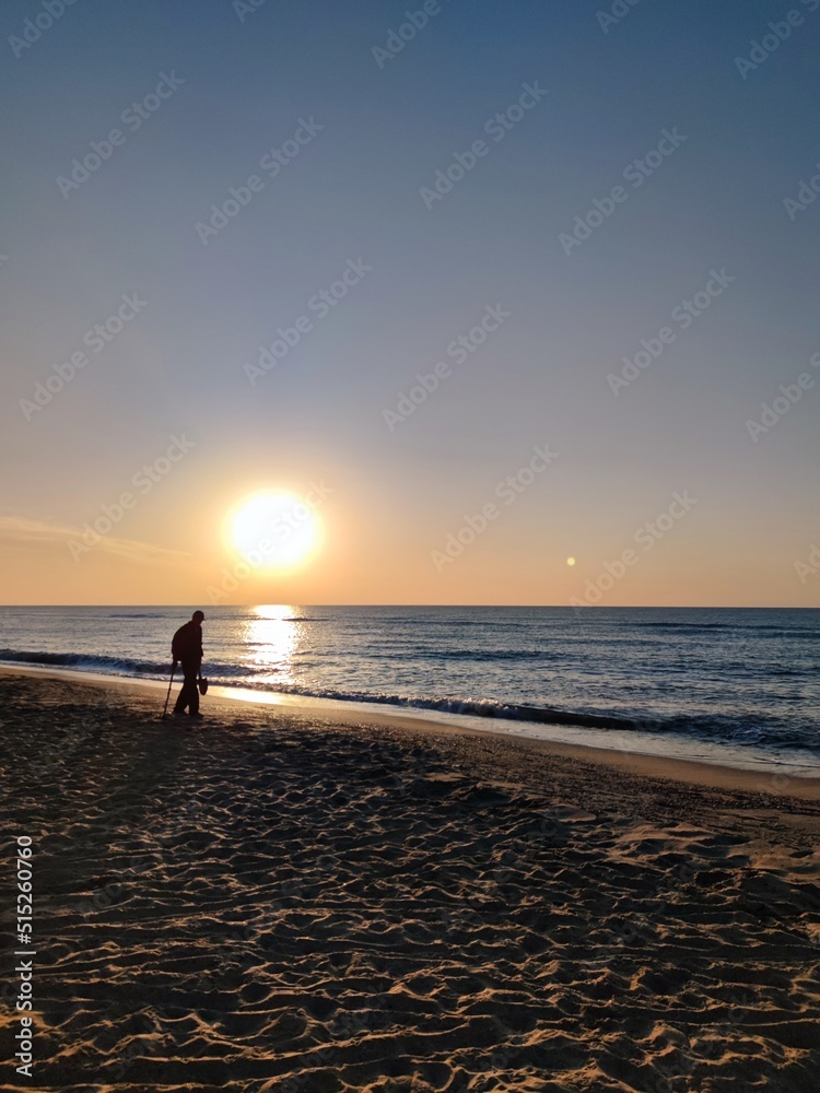 sunset, beach, sea, ocean, sun, sky, water, sunrise, people, silhouette, nature, sand, landscape, vacation, couple, coast, walking, summer, dusk, travel, clouds, woman, orange