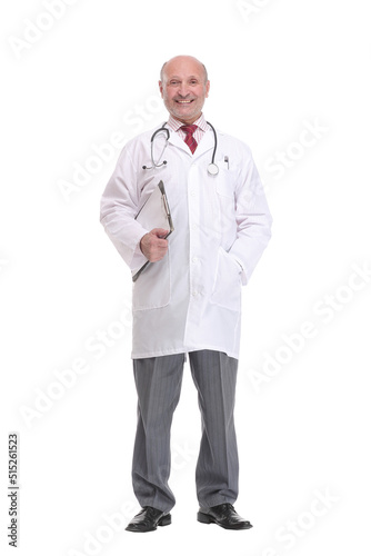Full length portrait of a mature doctor holding a clipboard and posing