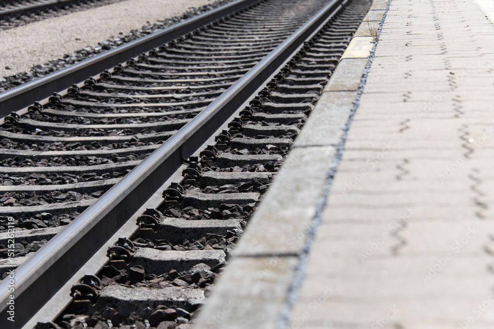 Ground railroad tracks running diagonally platform concept Ground railroad tracks running diagonally platform concept