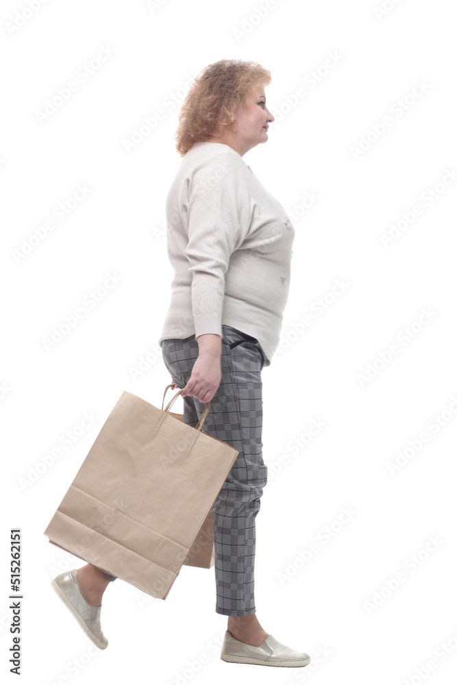 casual adult woman with shopping bags. isolated on a white casual adult woman with shopping bags. isolated on a white
