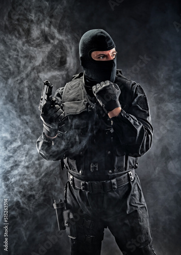 Obraz na płótnie Soldier with a handgun