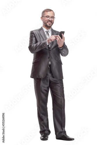 Executive business man with a smartphone. isolated on a white background.