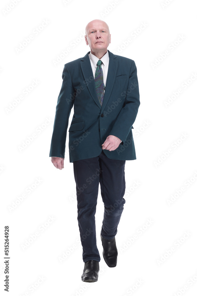 Mature business man striding forward. isolated on a white background. Mature business man striding forward. isolated on a white background.