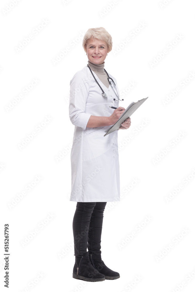 in full growth. responsible female doctor with clipboard . in full growth. responsible female doctor with clipboard .