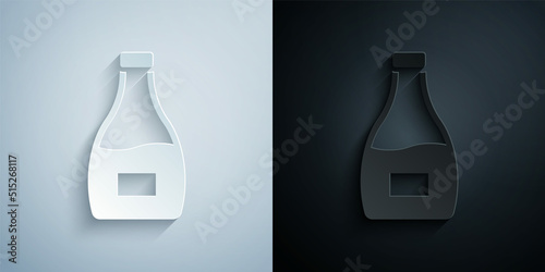 Paper cut Sauce bottle icon isolated on grey and black background. Ketchup, mustard and mayonnaise bottles with sauce for fast food. Paper art style. Vector