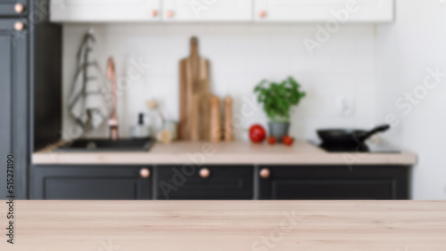 Raw vegetables and kitchenware on background in kitchen © brizmaker