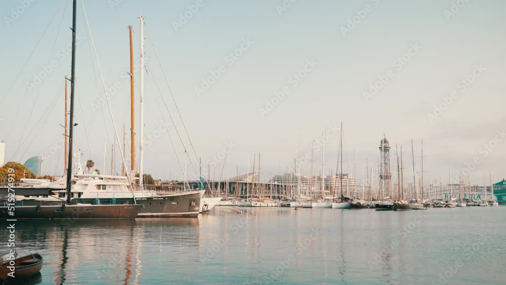 Offshore sailing yachts stand in the harbor at dawn Offshore sailing yachts stand in the harbor at dawn