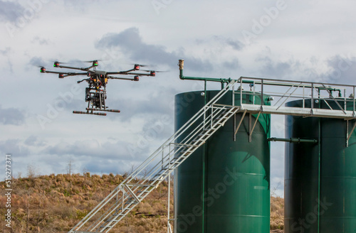 Drone inspects for methane leaks on well site photo