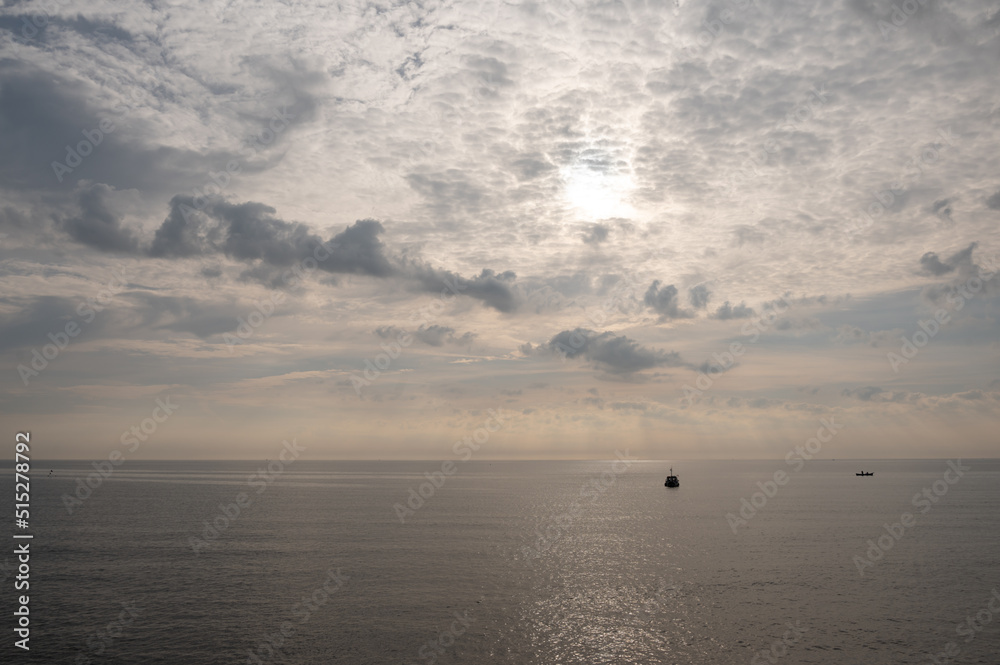 sea fishing boat with early morning sky 