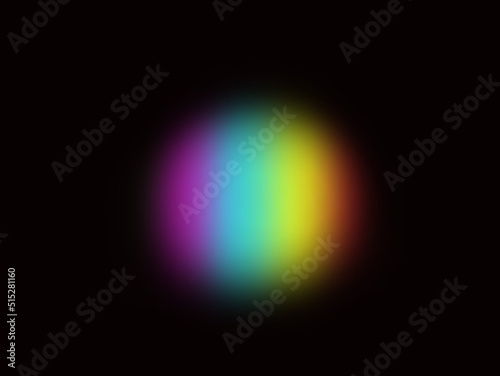 Abstract blurred rainbow circle on black background