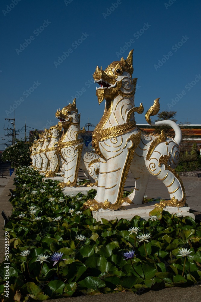 The Leo or lion serves as protection. Preserving the place at Wat Phra That Choeng Chum Worawihan It is an important sacred place of the house. couple from ancient times.