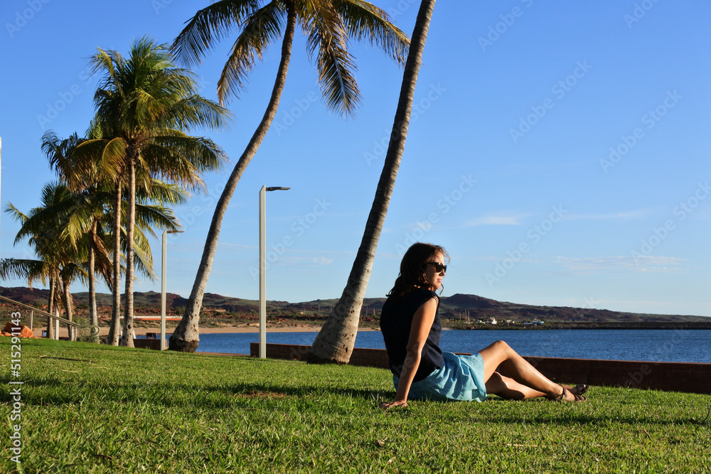 Australian woman enjoys Dampier foreshore picnic area in Dampier Western Australia