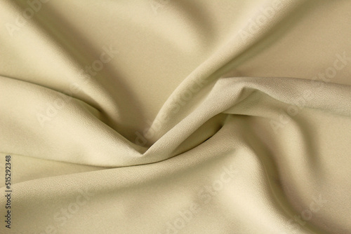 Grey crumpled fabric for creative background. Copy space. Vivid textile for wallpaper or design