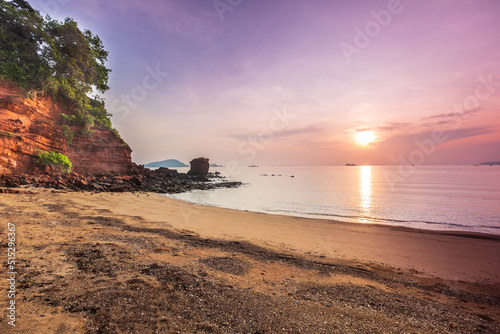 Colourful of sunset on the beach at Red Cliff, Prachuap KhiriKhan Province, Thailand. photo