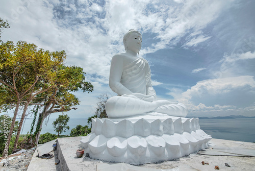 Luang Pho Tanjai, a large white Buddha image located on Koh Tan, Samui, Thailand. photo