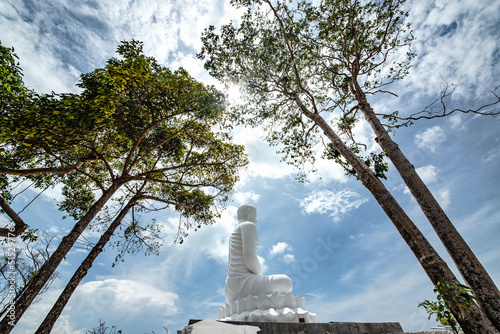 Luang Pho Tanjai, a large white Buddha image located on Koh Tan, Samui, Thailand. photo