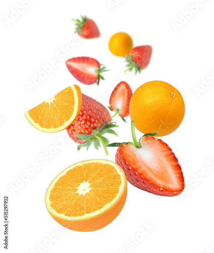 Wooden bowl with strawberry and orange fruit flying in the air isolated on white background. 