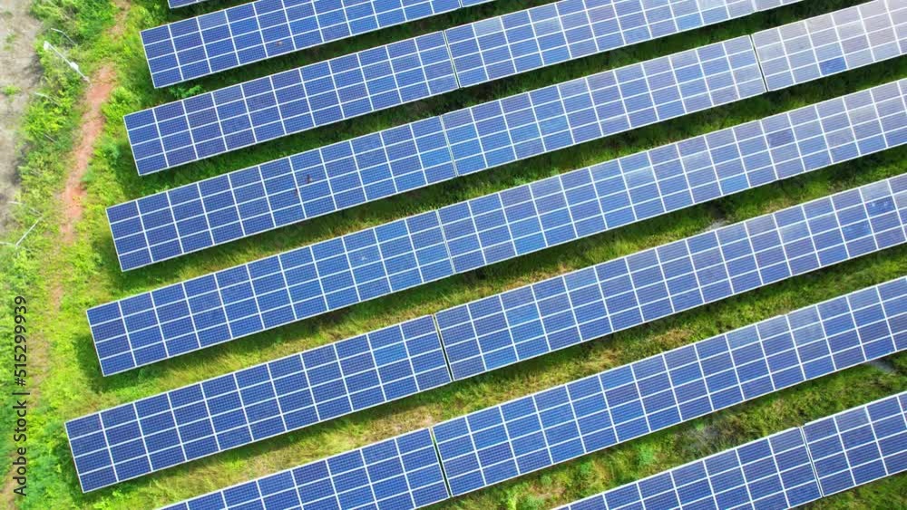 Drone fly over solar farm, renewable energy from solar. Clean energy production in Samut Songkhram, Thailand. drone footage. 4k
Drone fly over solar farm, renewable energy from solar. Clean energy production in Samut Songkhram, Thailand. drone footage. 4k
