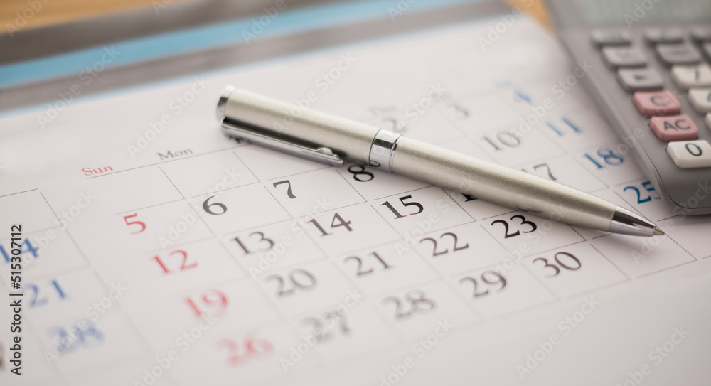 Calendar, calculator and pen on the desk. Calendar, calculator and pen on the desk.