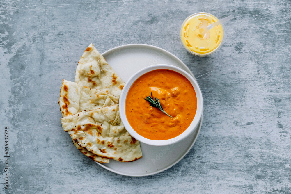 butter chicken with naan Bread butter chicken with naan Bread
